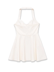 Detail of white halter neck mini dress with A-line silhouette and waist cinching