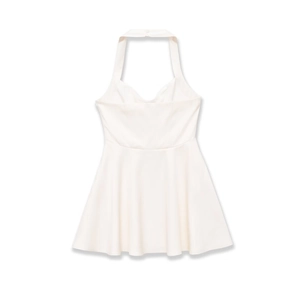 Flat lay of a white halter neck mini dress with heart-shaped neckline and A-line skirt