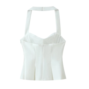 Detailed view of white halter top with sweetheart neckline and neck button closure