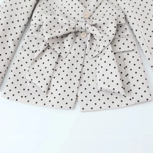 Blazer da donna a pois con grande fiocco in vita e revers classici ed eleganti