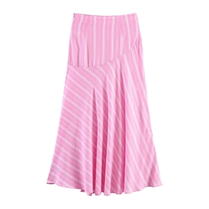 Detail of pink and white striped midi skirt featuring unique asymmetrical fabric pattern