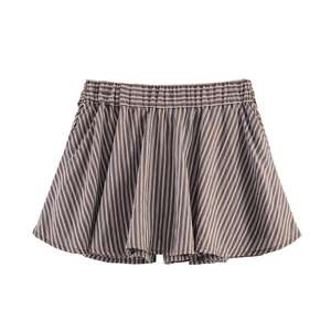 Detail of striped brown high-waist shorts with elastic pleats and lightweight fabric