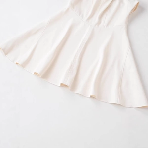 Elegant white halter neck mini dress with high waist and flared A-line silhouette