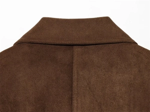 Detail of dark brown faux suede jacket collar with visible neat double-stitching finish