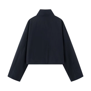 Rear view of sleek dark blue standing collar jacket showing smooth windproof fabric texture