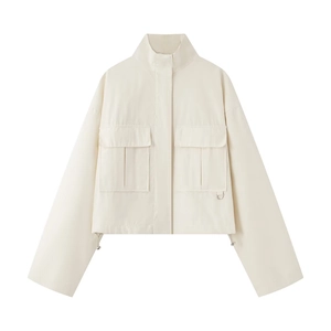 Detailed view of beige utility jacket with stand collar, flap pockets and hem drawstring