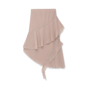 Detail of elegant dusty rose chiffon skirt with layered ruffles and asymmetric hem