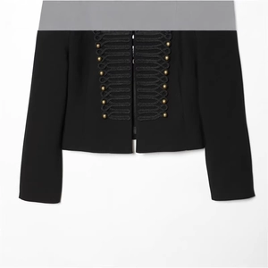 Short black wool military jacket for women featuring gold buttons and braided hussar trim
