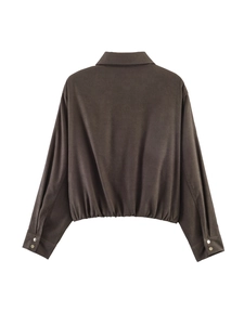 Back view of a charcoal grey jacket featuring a ribbed elastic hem and metal button cuffs