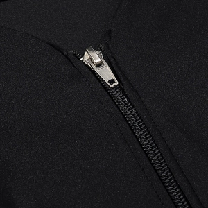 Close-up of high-quality silver metal zipper on a black lace拼接 fashion base layer top