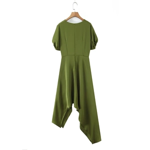 Detailed view of olive green satin dress with asymmetrical hem and puffed short sleeves