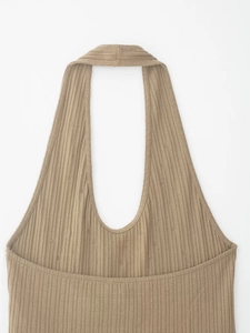 Detail view of khaki ribbed knit halter top featuring a deep U-neckline and textured fabric