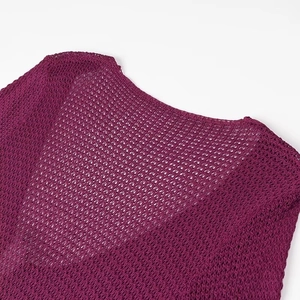 Detail shot of the purple crochet knit pattern on a V-neck hollow out summer dress