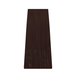 Detail of high-waist knit midi skirt with hollow herringbone texture in dark coffee