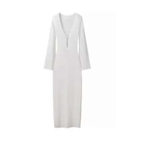 White long sleeve knit maxi dress featuring a deep V-neck and decorative metal ring detail