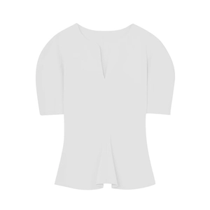 Close-up of the V-neckline and puffed sleeve details on white babydoll top