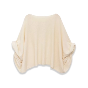 Off-white knit top featuring a wide boat neck and loose batwing sleeves detail