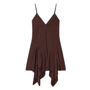 Detail of asymmetric layered ruffle hem on a brown satin V-neck camisole dress