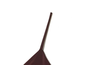 Detail of slim spaghetti shoulder strap on a deep brown knit dress with fine stitching