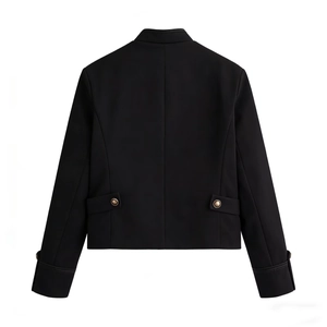 Rear view detail of black stand-collar blazer with bronze buttons and fitted tailoring