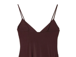 Detail of a deep brown camisole dress featuring a classic V-neckline and smooth knit fabric