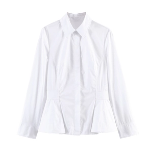 Detailed view of white long sleeve shirt with pleated peplum waist and hidden buttons