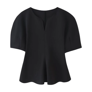Women's black peplum top with short sleeves and a unique V-neckline in a minimalist style
