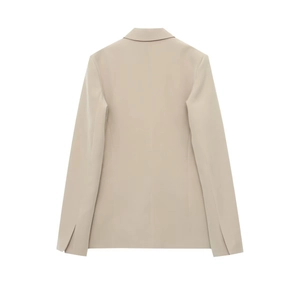 Back view of slim fit cream blazer with notched lapels and slit detail on the cuffs