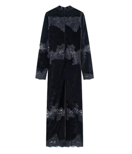 Back view of black velvet dress with delicate lace floral appliques and invisible zipper