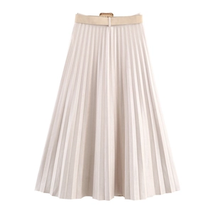 Detailed view of beige pleated midi skirt featuring a matching minimalist belt and texture