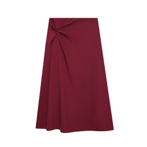 Detail of high waist twist knot and elegant pleats on burgundy A-line midi skirt