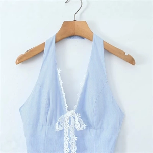 Women's blue and white striped halter top with white lace trim and front bow detail