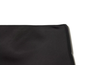 Close-up of black lace splicing skirt showing premium twill fabric texture and weaving