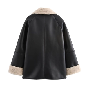 Rear view of women's oversized black faux leather jacket with beige faux shearling trim