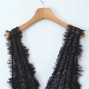 Elegant black eyelash lace dress with deep V-neck and intricate floral transparent details