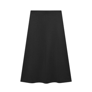 Detail view of the vertical seam and smooth fabric on this black A-line midi skirt