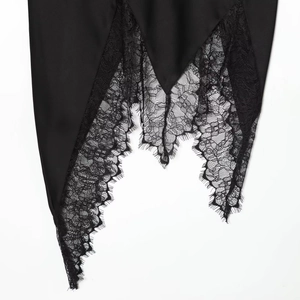 Elegant black satin midi skirt with irregular hemline and eyelash lace detailing