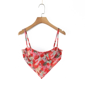 Detail of red strawberry print camisole with lace trim and heart-shaped neckline
