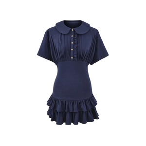 Detail of navy blue dress featuring Peter Pan collar and ruffled hem with wooden buttons