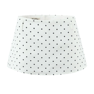 Detail shot of white polka dot mini skirt showing the hidden zipper and belt loops