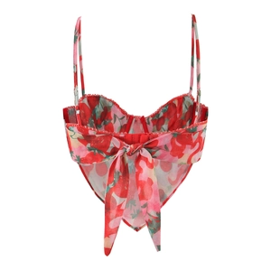 Detail of strawberry print camisole top featuring a large decorative back bow tie