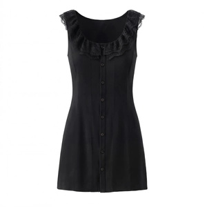 Detailed view of black sleeveless dress with ruffled lace trim and button front detail