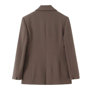Detail view of the back of a slim-fit dark brown women suit blazer with back vent