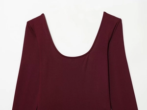 Detail view of burgundy long sleeve bodysuit featuring elegant scoop neck design