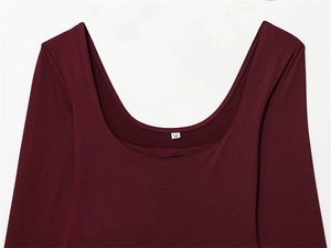 Detail of burgundy U-neck bodysuit showing smooth fabric texture and size M label