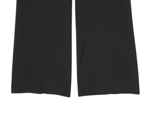 Detailed close-up showing the high-quality fabric texture and hem of black casual trousers