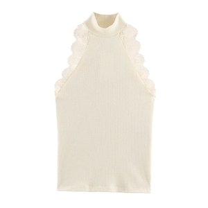 Close-up of elegant lace trim on a cream-white ribbed knit sleeveless turtleneck top
