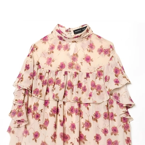 Women's elegant floral chiffon top with high neck and delicate ruffled layers in beige