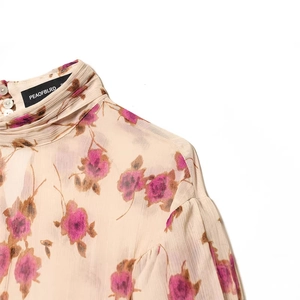 Elegant beige floral chiffon shirt featuring high neck ruffle and long puff sleeves