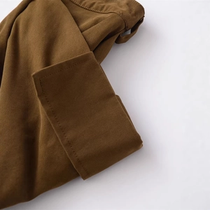 Slim fit khaki skirt with premium twill texture and precision stitching details